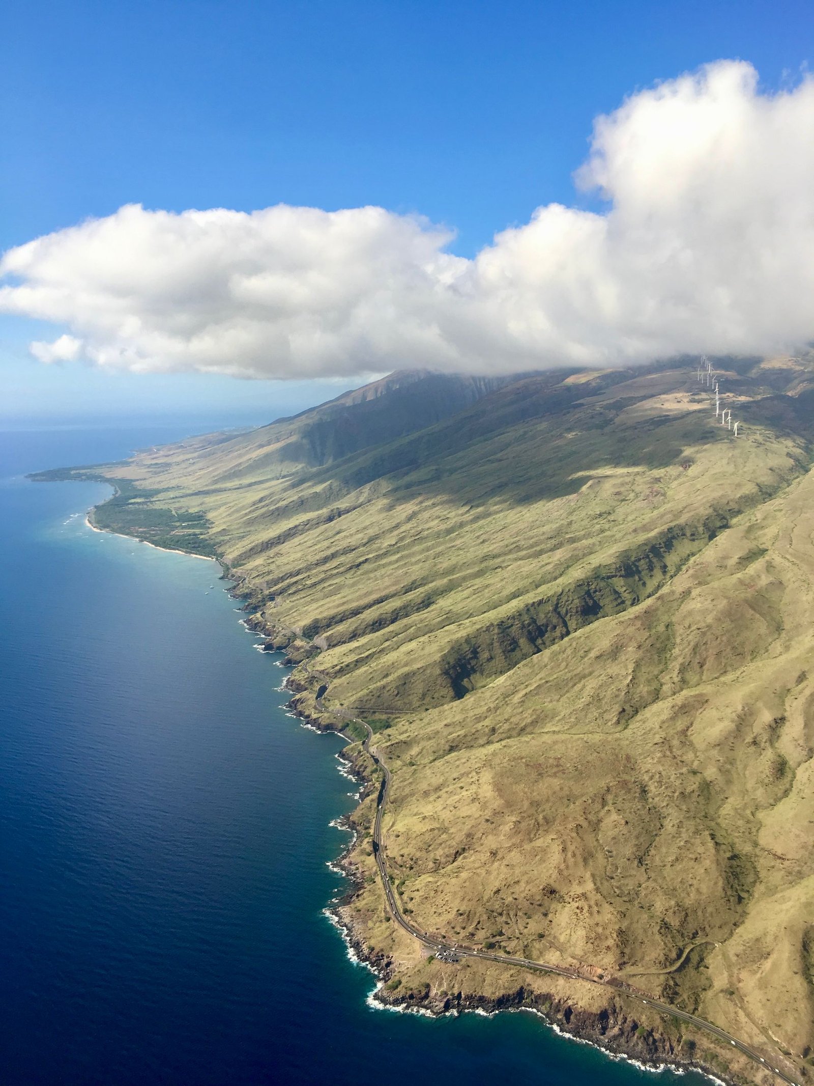 The West Maui mountains rising above the coastline near Wailuku